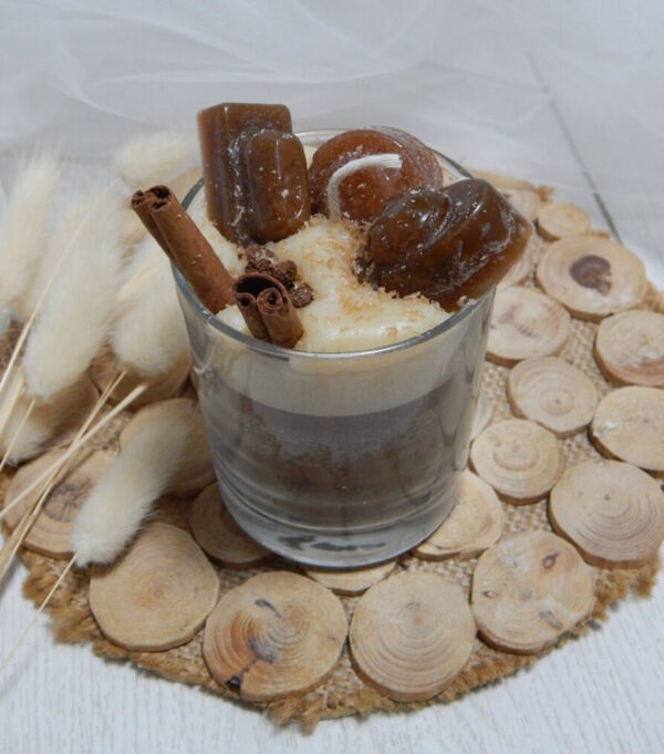English toffee flavored coffee in a glass with toffee flavored candies as garnish
