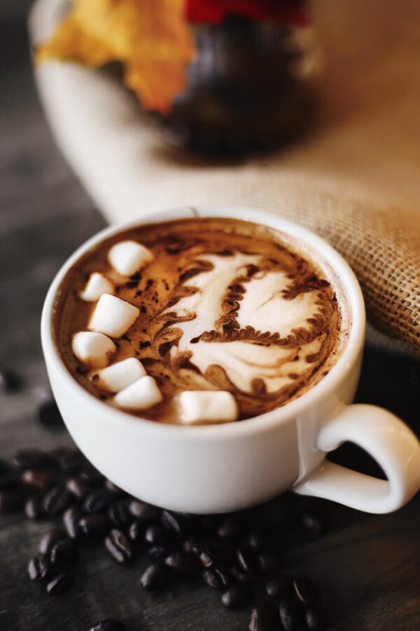 Fireside marshmallow flavored coffee in a mug with marshmallows on top